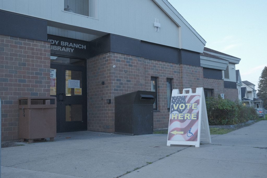Polling location sign in front of the Mundy Branch Library.