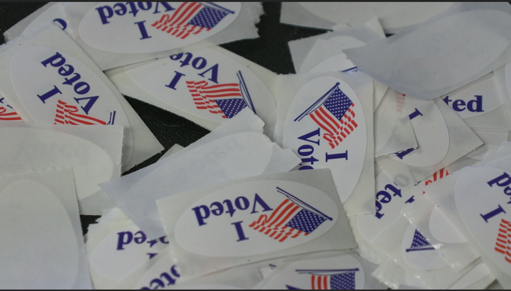 Piles of "I Voted" stickers